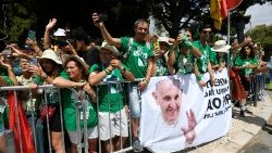 Pilgrims await Pope Francis' arrival in Lisbon for WYD