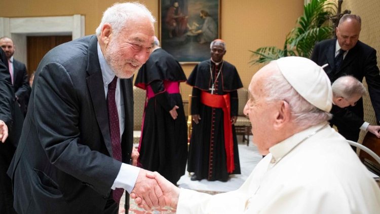 Pope Francis greets Professor Joseph Stiglitz at the "Debt Crisis in the Global South" meeting at the Vatican in June 2024
