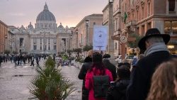 Pilgrims making the journey to the Holy Door in St. Peter's Basilica in Rome