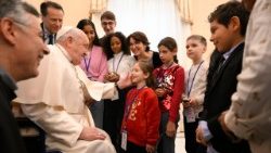 Pope Francis with children at the first International Summit on Children’s Rights