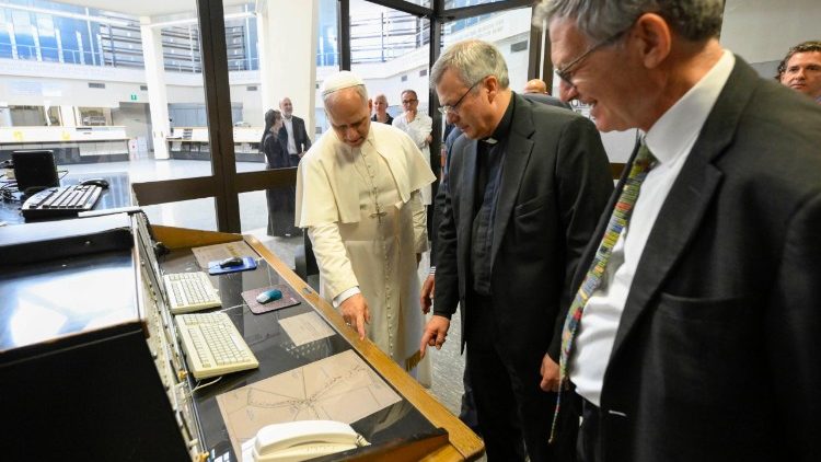 Pope Leo XIV with the Paolo Ruffini, the Prefect of the Dicastery for Communication (right) and Monsignor Lucio Ruiz, the Secretary, during the Pope's visit to Santa Maria di Galeria
