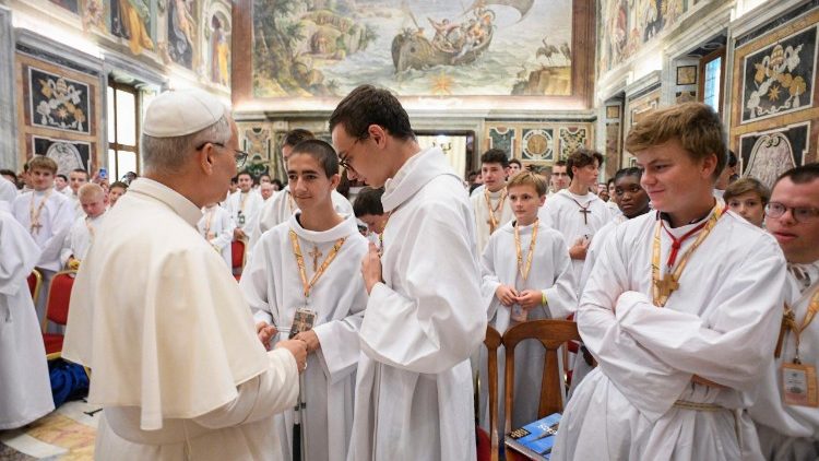 Pope Leo XIV greets several French altar servers at the audience on August 25, 2025