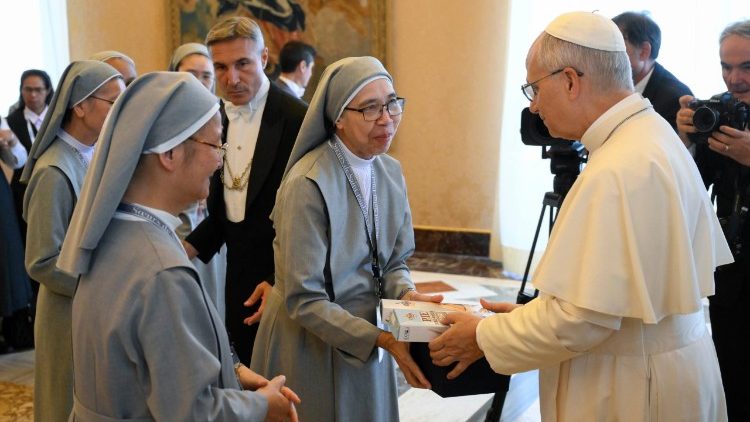 Pope Leo and the participants in the audience