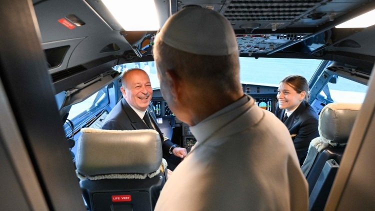 Pope Leo greets the pilots of the papal plane
