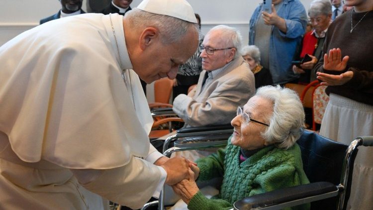 The Pope greets a care home resident