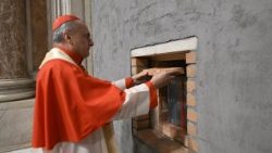 Cardinal Archpriest Gambetti places a brick in the wall that seals the Jubilee Holy Door of St. Peter's Basilica