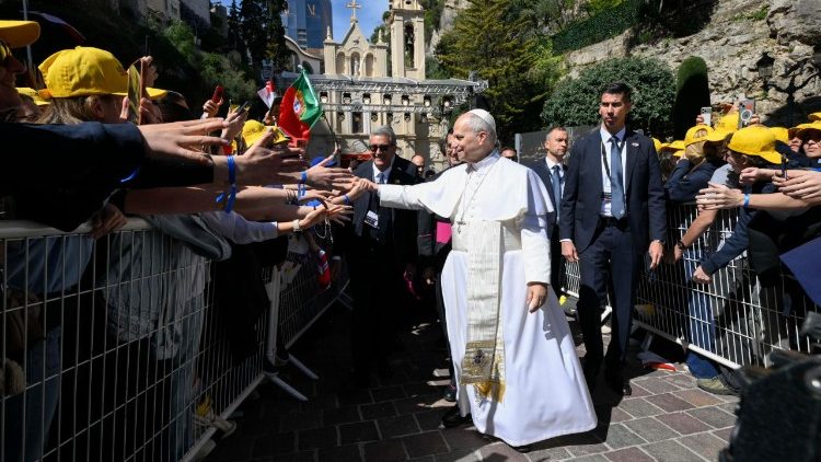 Pope Leo greets some of the young people gathered for the event