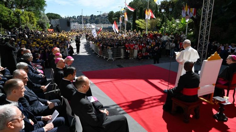 The Pope reads his answers to the questions
