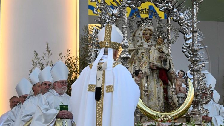 Pope Leo prays before the Virgen del Pino, at the conclusion of Mass