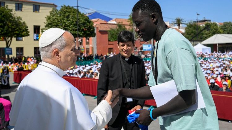 Pope Leo earlier in the day at a meeting with migrants