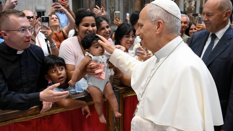 Pope Leo greets pilgrims before the General Audience