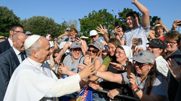 Pope Leo greets young people upon his arrival in Assisi