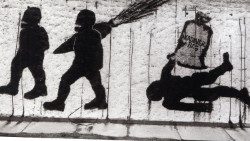 Graffito intitolato "The Harshness Of War" sul Muro di Berlino