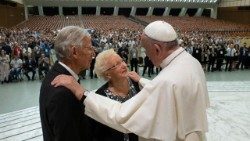 Pope Francis with an elderly couple