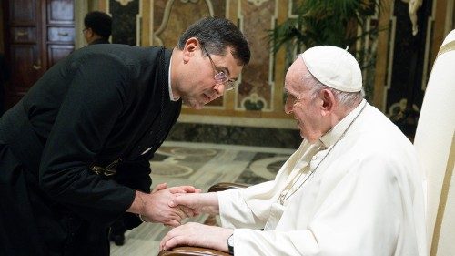 Fr. Pavlo Vyshkovskyi, OMI, greets Pope Francis at an audience in early October