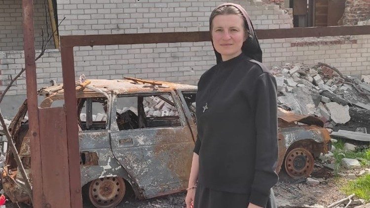 Sister Teodora in the midst of the ruins in Chernihiv