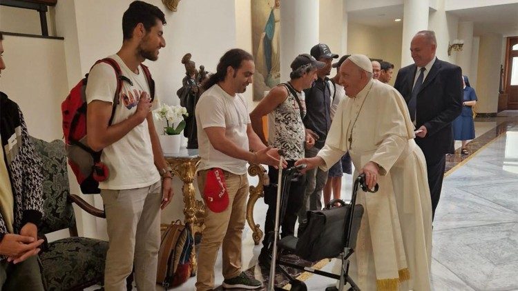 Pope Francis greets residents of the Gift of Mercy Dormitory