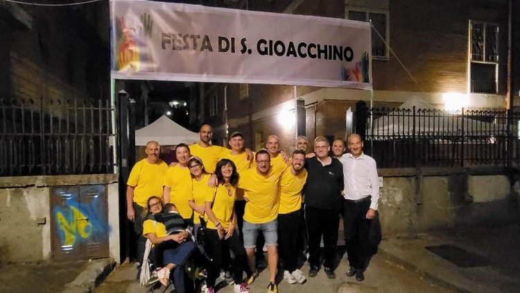 Padre Pietro with some of the families who helped organize the celebration of the parish