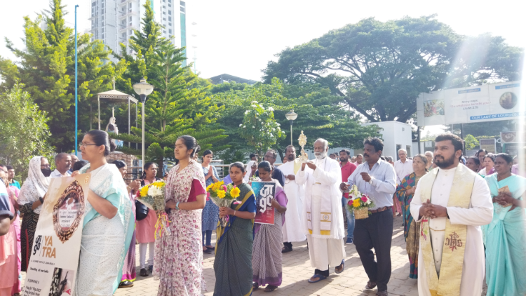 A procession with a relic of Pope St. John Paul II