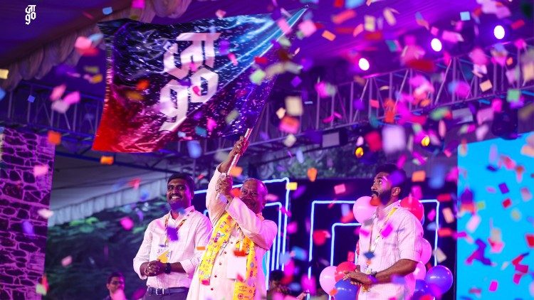 Archbishop Peter Machado and the National and General coordinators of Jesus Youth.