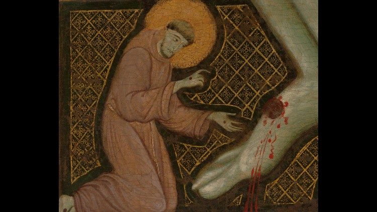 Maestro di San Francesco, Crocifisso di San Francesco al Prato di Perugia, particolare del Santo di Assisi ai piedi del Cristo