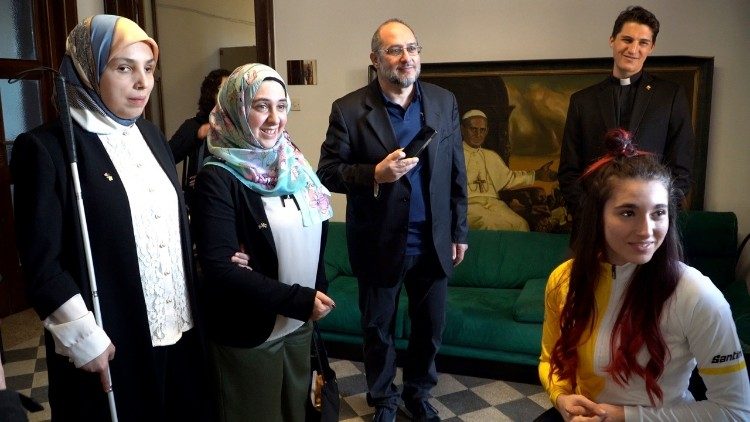 Giampaolo Mattei, centre, with Special Advisor Minkara and members of Athletica Vaticana