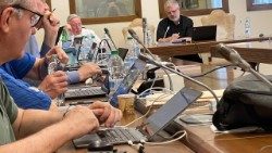 The team of theologians at work