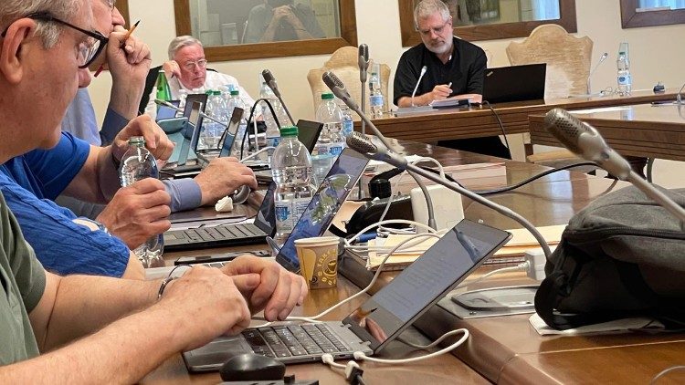 The team of theologians at work