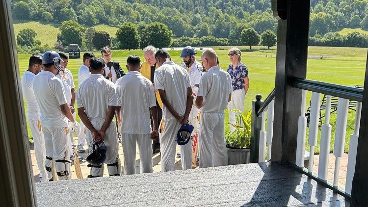 The Vatican team gathers on the pavillion