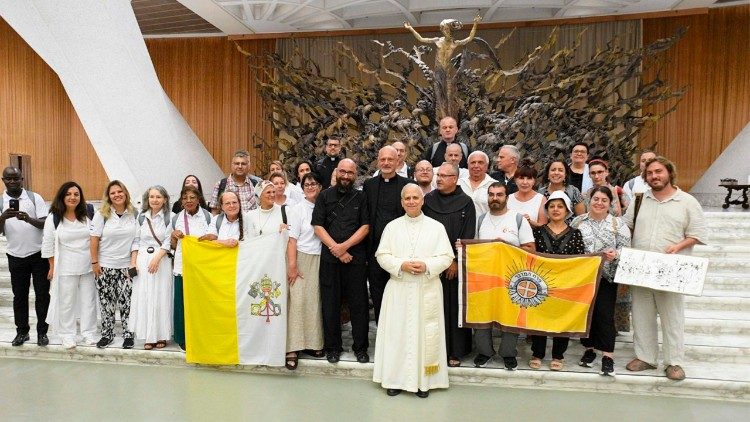 Pope Leo takes a group photo with the St. James Vicariate