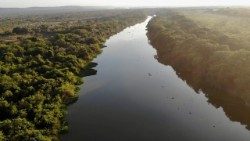 Aerial view of the Amazon River — the most powerful river in the world — winding its way through Brazil, Colombia, and Peru.