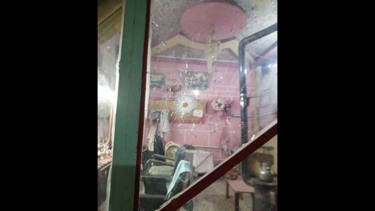 Negozio danneggiato dai proiettili, Homs