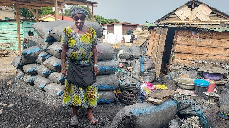 A Hope for Life member who makes a living selling charcoal