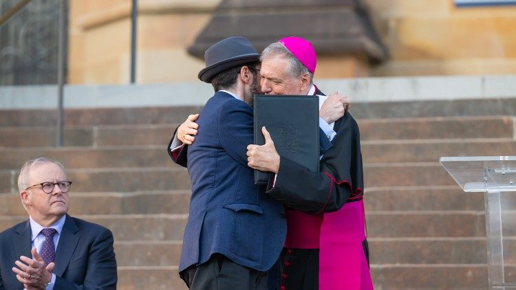 Archbishop Anthony Fisher embraces the Chief Minister of the Great Synagogue, Rabbi Benjamin Elton