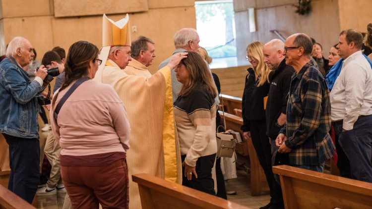 Archbishop Gomez of Los Angeles greeting parishioners after 9 January Mass for victims of the fires  (Copyright: Archdiocese of Los Angeles/Isabel Cacho.