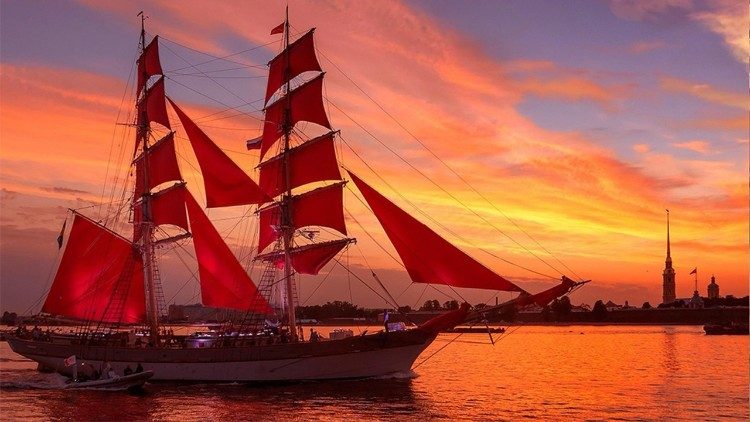 Vitorlás a naplementében