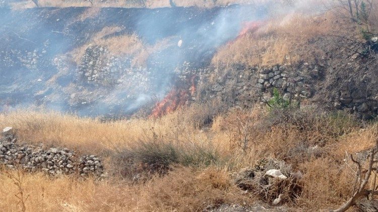 A fire burns near Taybeh in the West Bank