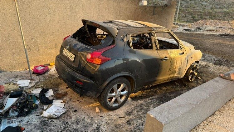 One of the vehicles set on fire during the attack on Taibeh