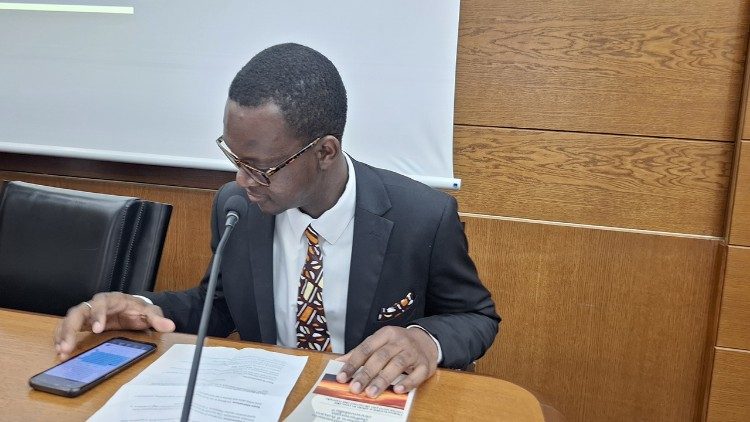 Mr Atchikiti at a Conference