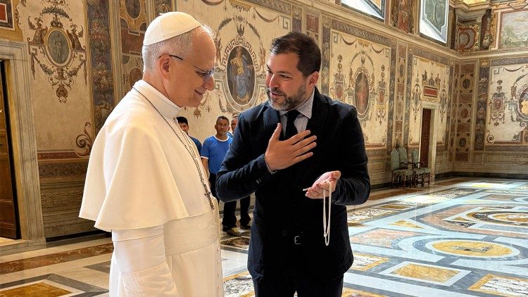 Presenting the reliquary cross to Pope Leo XIV