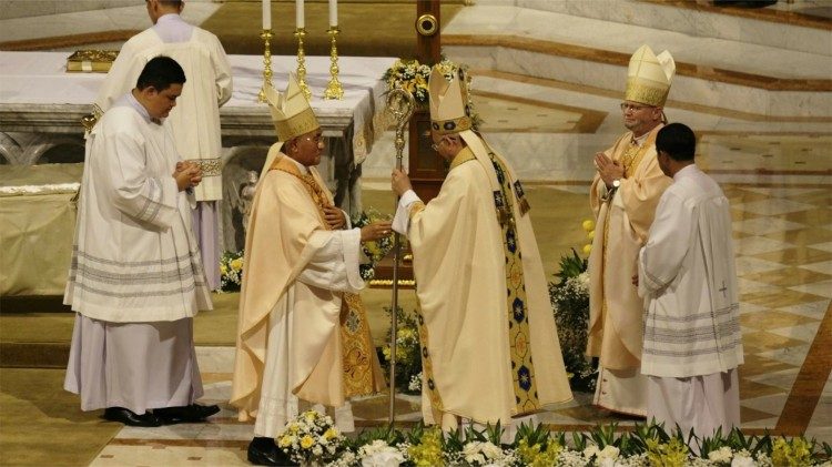 Archbishop Francis Xavier Vira Arpondratana receives the crosier during his installation as the new Archbishop of Bangkok at Assumption Cathedral on March 2, 2025. Photo by Peter Monthienvichienchai/ LiCAS News