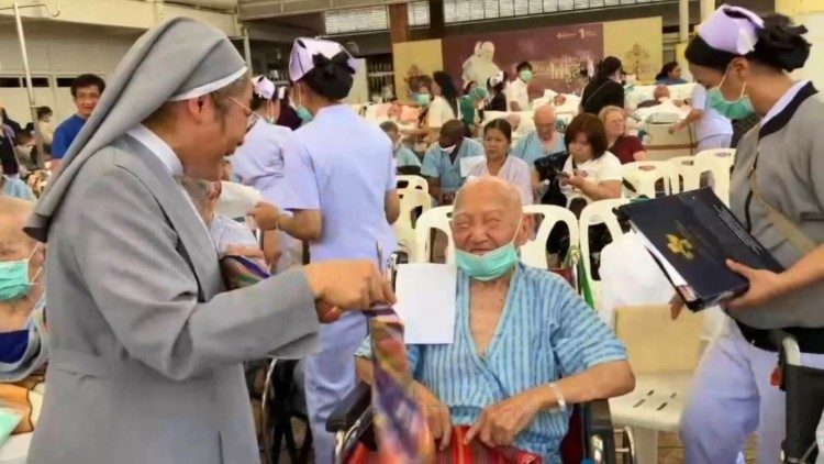 Elderly patients are assisted and comforted by hospital staff and religious sisters at St. Louis Hospital following the earthquake in Bangkok. Photo courtesy of Sr. Marie Agnes Busap