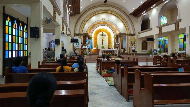 Parishioners and evacuees attend morning Mass at St. John Nepomucene Parish in Bonga, Bacacay, where prayers were offered for protection from Super Typhoon Uwan. After the Mass, the parish community served a warm breakfast to those taking shelter in the church. Photo credit: St. John Nepomucene Parish, Bonga, Bacacay / Diocese of Legazpi
