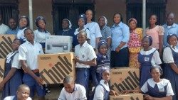 In this old photo, some students of St. Mary’s, Papiri, are seen alongside three OLA Sisters