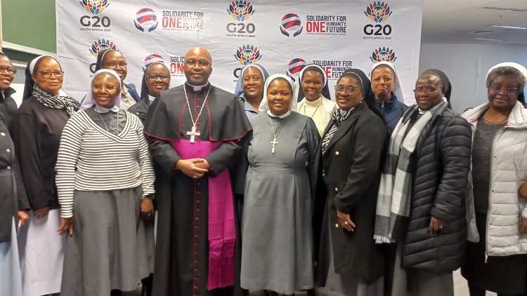 Bishop Thulani Victor Mbuyisa, at the G20 summit alongside some religious women