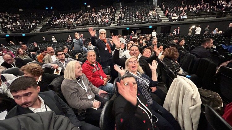 Can Sancar, standing, with the group of Christians 