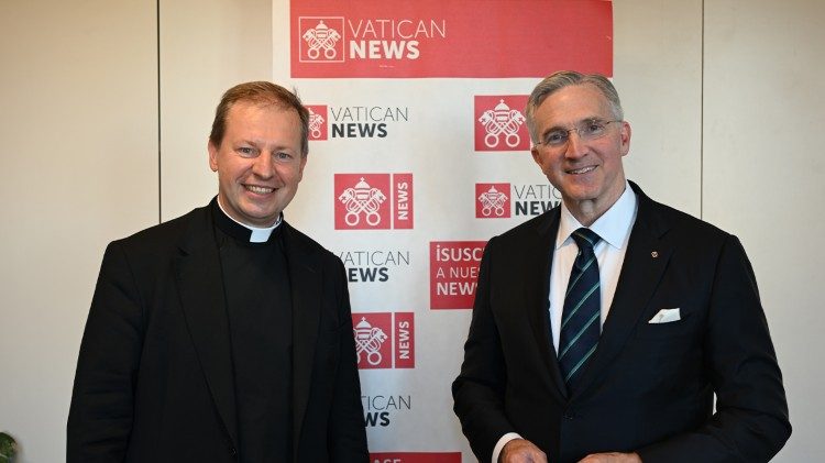 Mr. Kelly (R) with Fr. Paweł Rytel-Andrianik