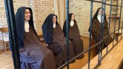Cloistered nuns from the Carmelite monastery speak with journalists