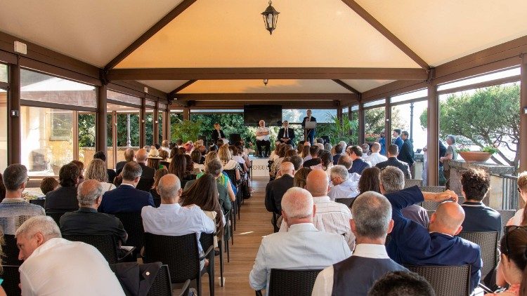 Conference in Borgo Laudato si' before the debut of the exhibition