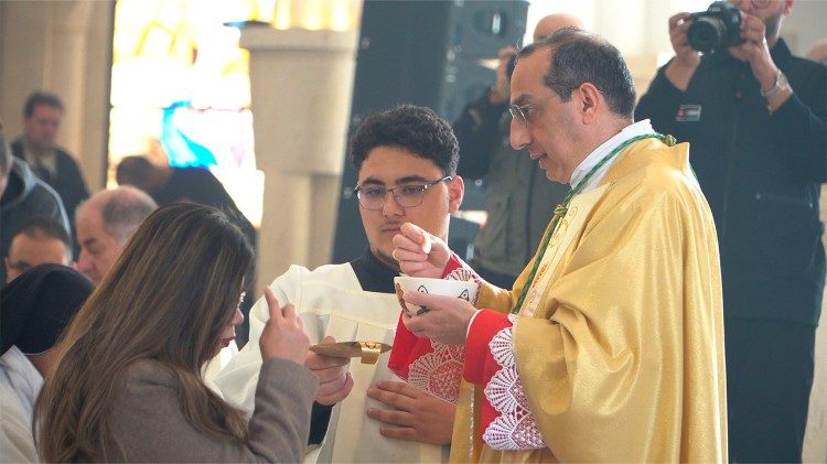 During the liturgy, the faithful were sprinkled with holy water that had been collected from the Jordan River before Mass